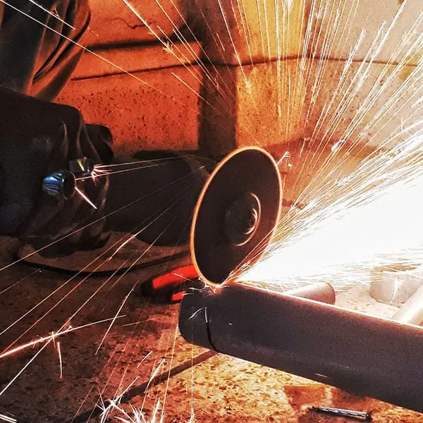 Uses of an Angle Grinder 3 Using an Angle Grinder to cut metal
