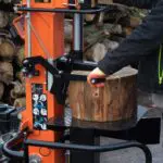 Splitting large round, petrol log splitter