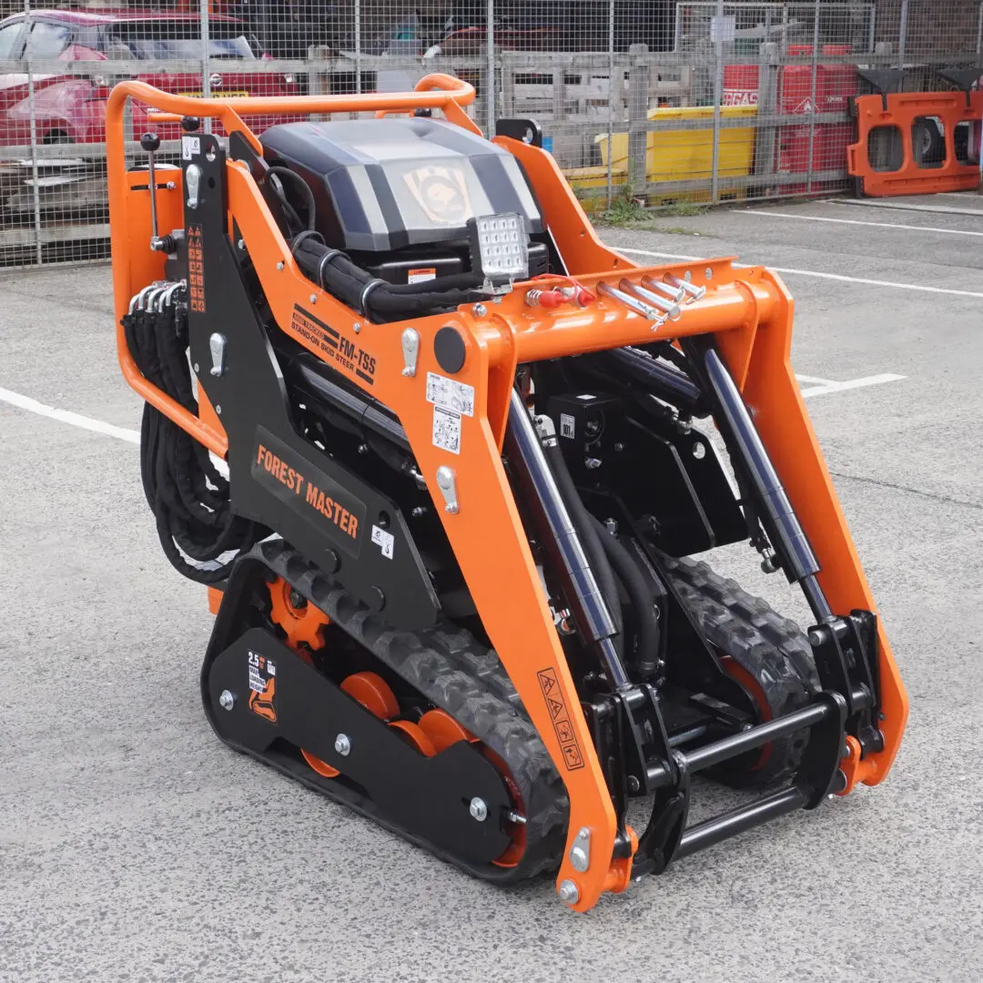 Forest Master stand-on mini skid steer loader side view