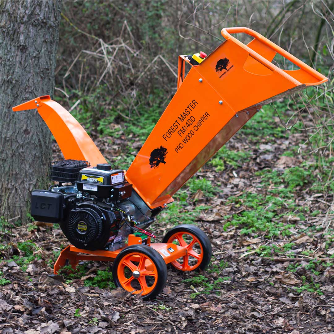 14hp petrol engine on wood chipper in woods