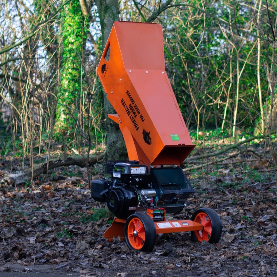 Professional Wood Chipper, Compact Commercial Chipper, Garden Shredder, Wood chipper in forest, open hopper chute