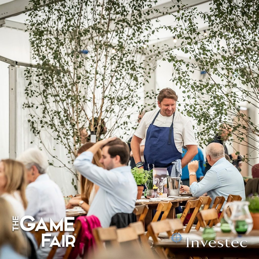 Chef, James Martin talking to guests at the Game Fair agriculture event