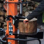 Splitting large round, petrol log splitter