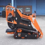 Forest Master stand-on mini skid steer loader side view